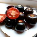 Eigenschaften und Beschreibung der Sorte der Tomate Indigo Rose