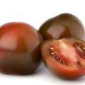 Egenskaper och beskrivning av Black Prince-tomatsorten, dess utbyte