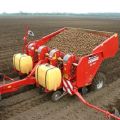 Typer av potatisplantare för en bakomgående traktor, hur du gör det själv, deras fördelar och principen för drift
