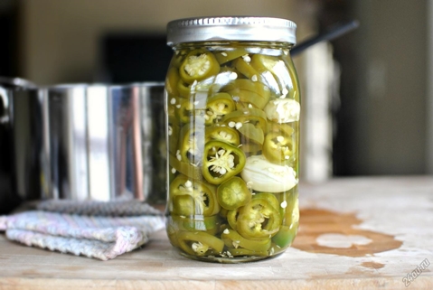 jalapeno peppers marinated in a jar