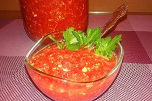 Žaliavos adžikos iš pomidorų ir česnakų receptai be virimo žiemai