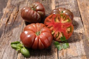 Pomidorų veislės aprašymas Moteriškoji dalis f1, jos ypatybės